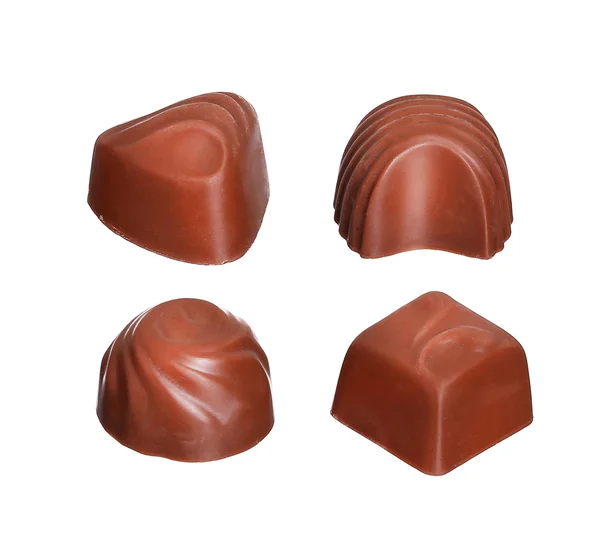 Коллекция шоколадных конфет на белом фоне — стоковое фото