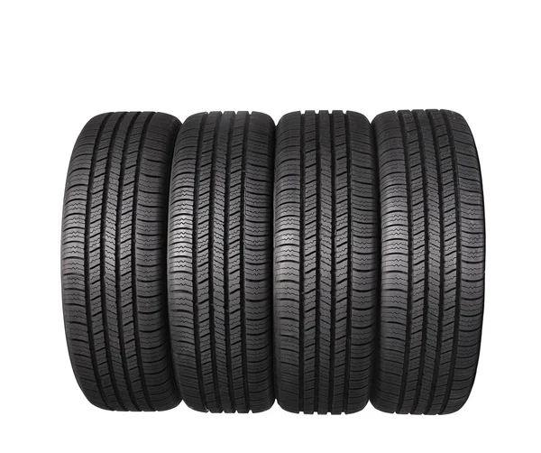 Beyaz arka plan üzerinde izole dört otomobil siyah kauçuk lastik