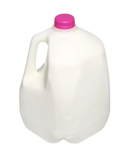 Galon mleka butelki z różowy czapka na białym tle na białym tle. — Zdjęcie stockowe