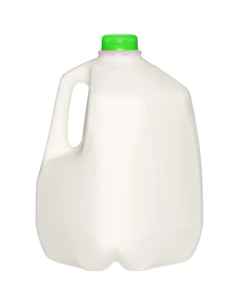 Bouteille de lait gallon avec bouchon vert isolé sur fond blanc . Photo De Stock