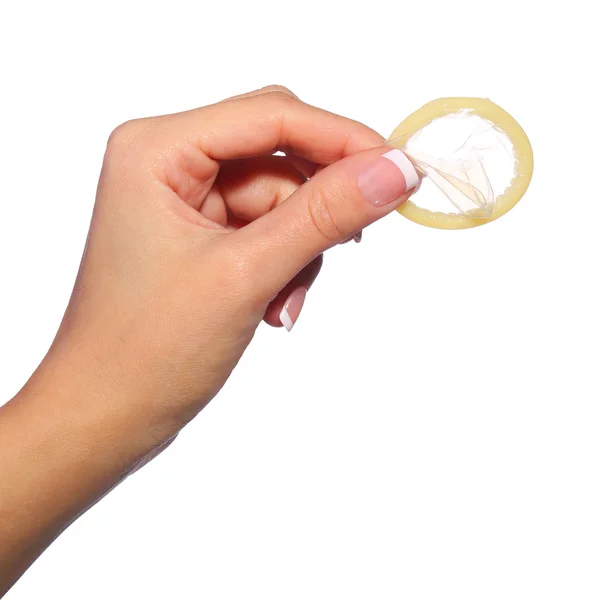 Condom in Female Hand isolated on white background. Contraceptio — Stock Photo, Image