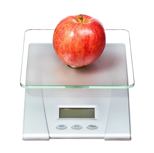 Kitchen scale weighting apples, Stock image