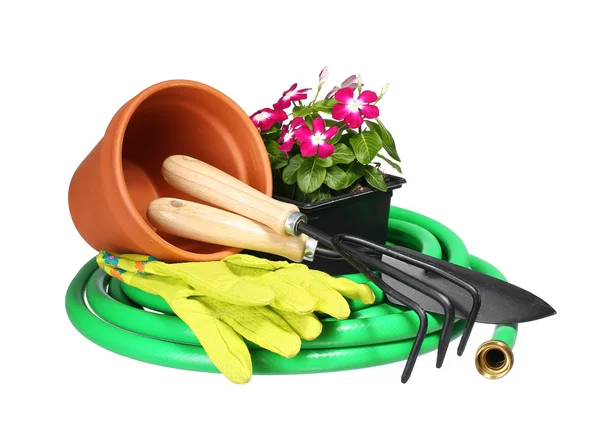 Bahçe aletleri ve çiçekler çatal ve üzerinde beyaz izole eldivenler 