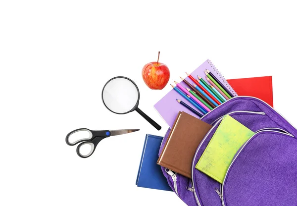 Books, apple, loupe, backpack and pencils isolated on white back — Stock Photo, Image