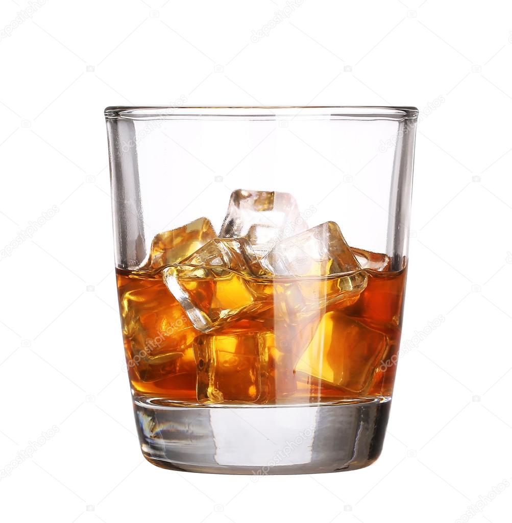 Glass of scotch whiskey with ice cube isolated on white backgrou