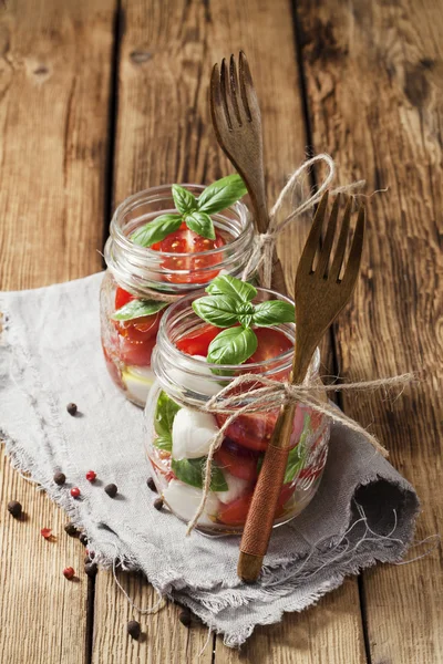 Caprese salad in mason jars — Stock Photo, Image