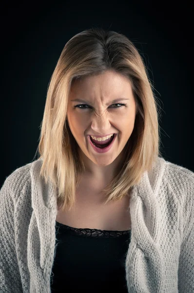 Angry blonde woman close up portrait — Stock Photo, Image