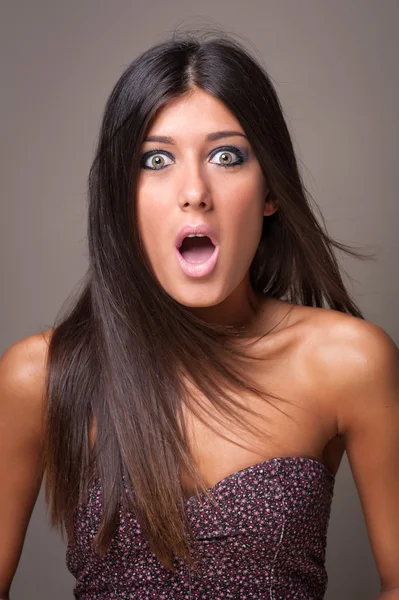 Surprised brunette woman portrait. — Stock Photo, Image