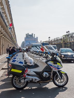 Police motorbikes parked on the street in Paris
