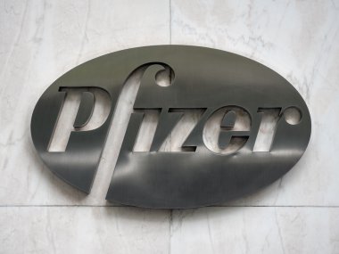 Metal plate logo of Pfizer in his headquarters building