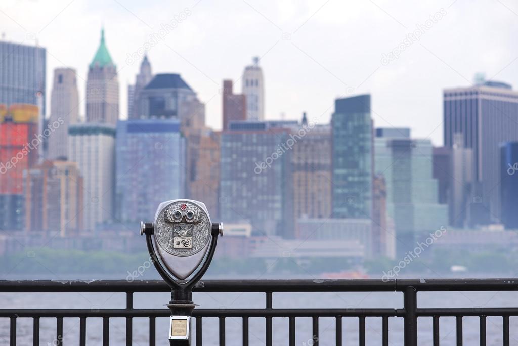 Binoculars and New York City Manhattan skyline