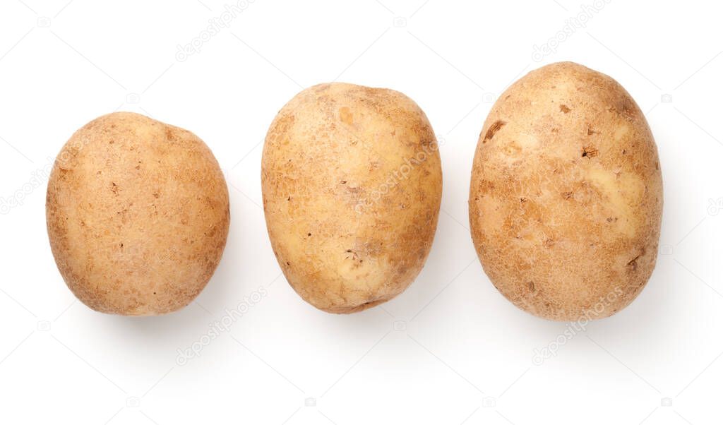 Fresh raw potatoes isolated on white background. View from above