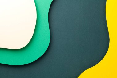 Çeşitli renkli dalgalı katmanlı kağıt zemin. Mesaj için boş oda. Üst Manzara. Düz yatıyordu