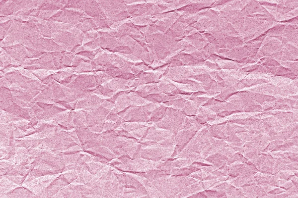 Old crumpled paper in pink tone — Stock Photo, Image