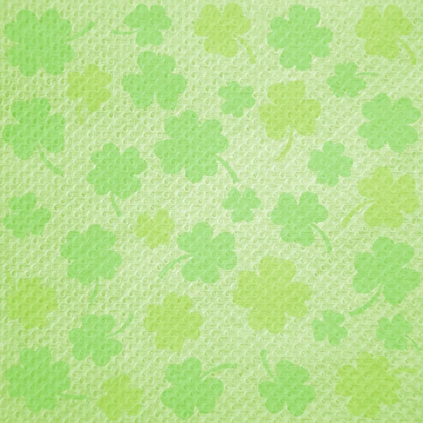 Shamrock på grön vävnad — Stockfoto