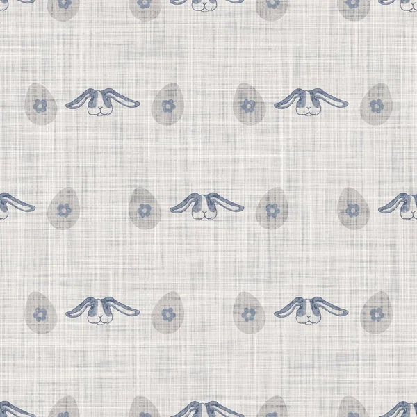 Seamless french farmhouse bunny linen printed fabric background. Provence blue pattern texture. Shabby chic style woven background. Textile rustic scandi all over print effect. Watercolor paint motif