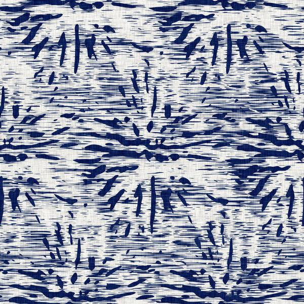 Indigo dyed fabric random flecks pattern texture. Seamless textile fashion cloth dye resist all over print. Japanese kimono block print. High resolution batik effect mottled swatch. 
