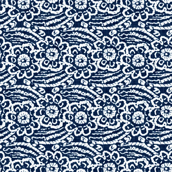 Acid wash blue jean effect texture with decorative linen floral motif background. Seamless denim textile fashion cloth fabric all over print.