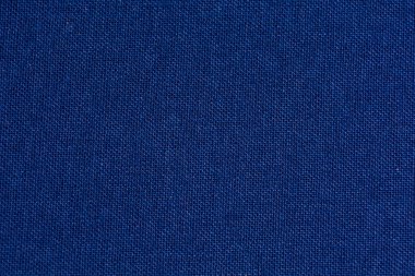 Mavi kumaş. Kitabın arka planı ve kumaş dokusu.