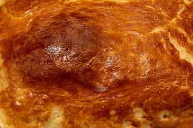 Kızarmış hamur dokusu arka planı. Kızarmış turta. Yakın plan..
