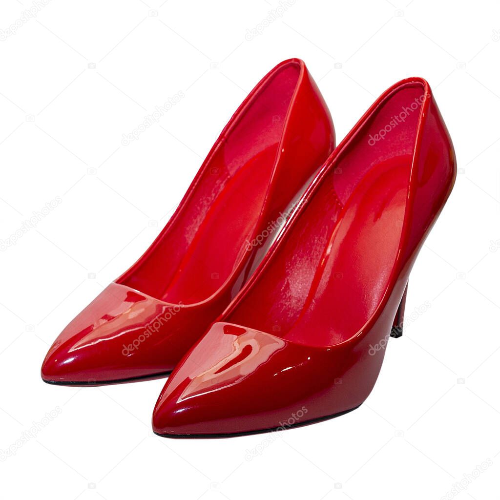 Red glamorous and fashionable shoes isolated on white background. Image for project and design.
