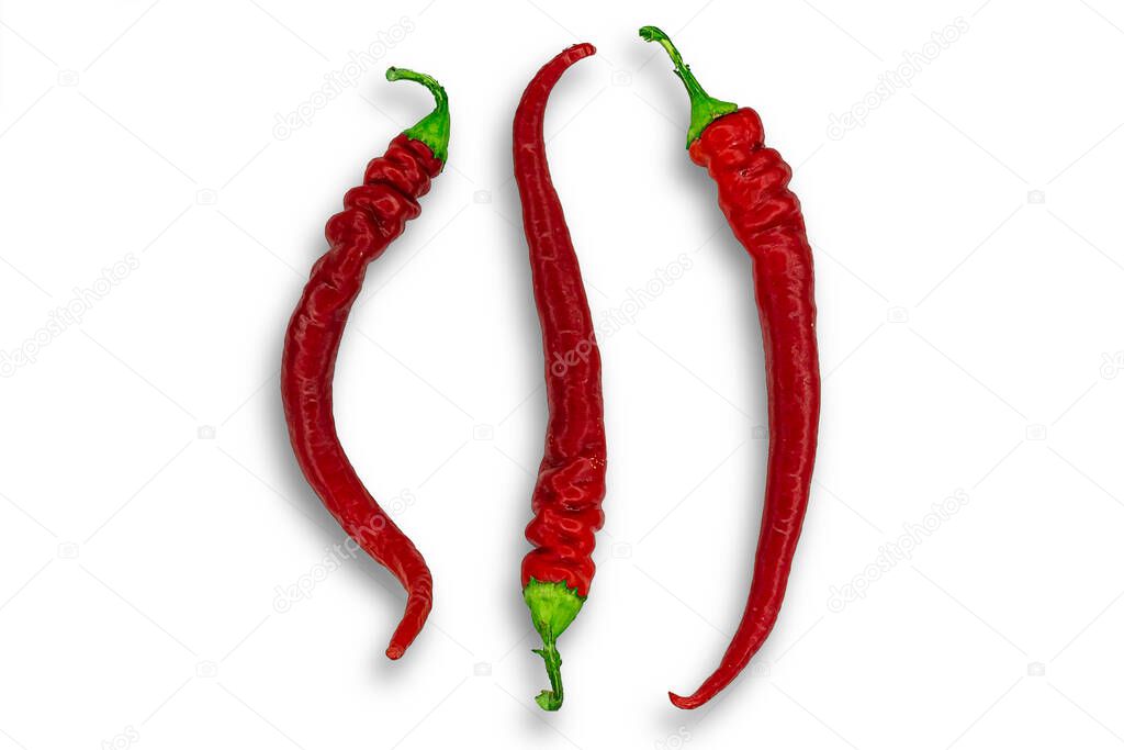 Three red hot peppers isolated on white background. Image for project and design.