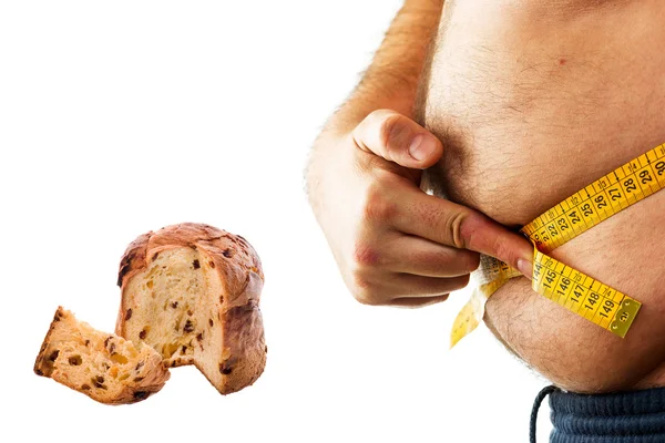 Großer Mann misst seinen Bauch mit Maßband — Stockfoto