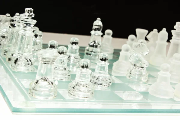 Schackspel i glas Stockbild