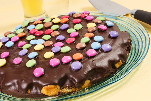 Chocolate cake with smarties — Stock Photo, Image