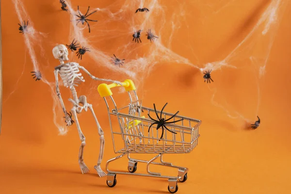 Plastic Decor Skeleton Shopping Trolley Brown Background Shopping Halloween Concept — Stock Photo, Image