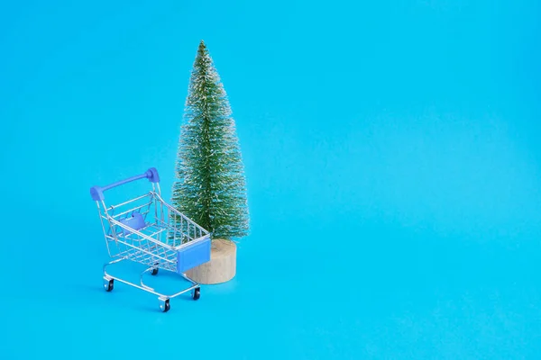 Shopping Cart Fir Tree Blue Background Christmas New Year Sale — Stock Photo, Image