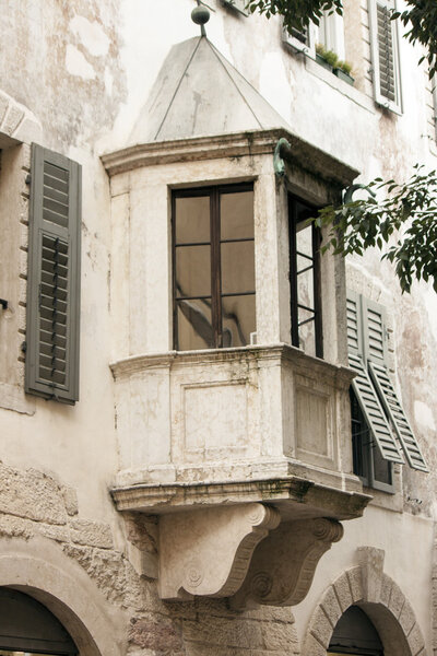Detail of the facade of an ancient building in Trento
