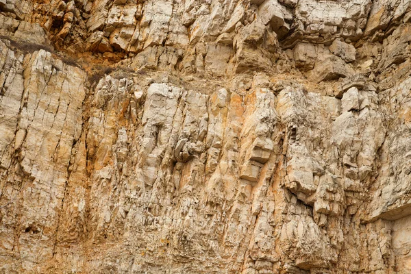 Cliff di fondo roccioso. Pietra montagna texture sfondo . — Foto Stock