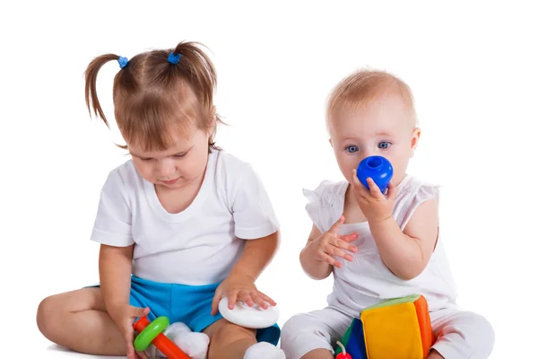 Niños juguetones sobre fondo blanco — Foto de Stock