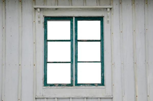 Geknipt glas in een oude venster — Stockfoto