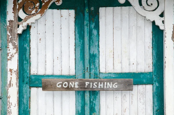 Partis panneau de pêche aux portes altérées — Photo