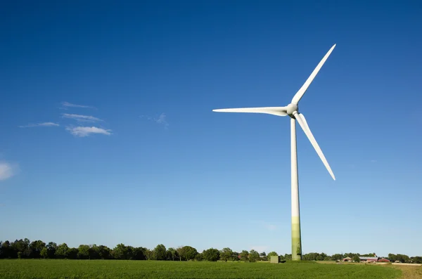 Windmill in a green landscape — Stock Photo, Image