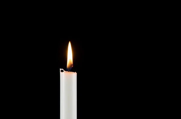 A white burning candle — Stock Photo, Image