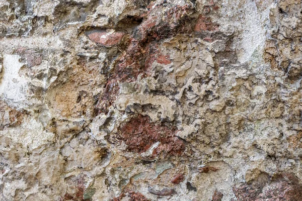 Kaba Renkli Kaya Yüzeyinin Dokusuna Sahip Doğal Bir Taş Duvar — Stok fotoğraf