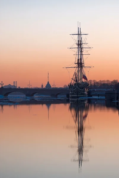 Sailboat at sunset. Stock Photo