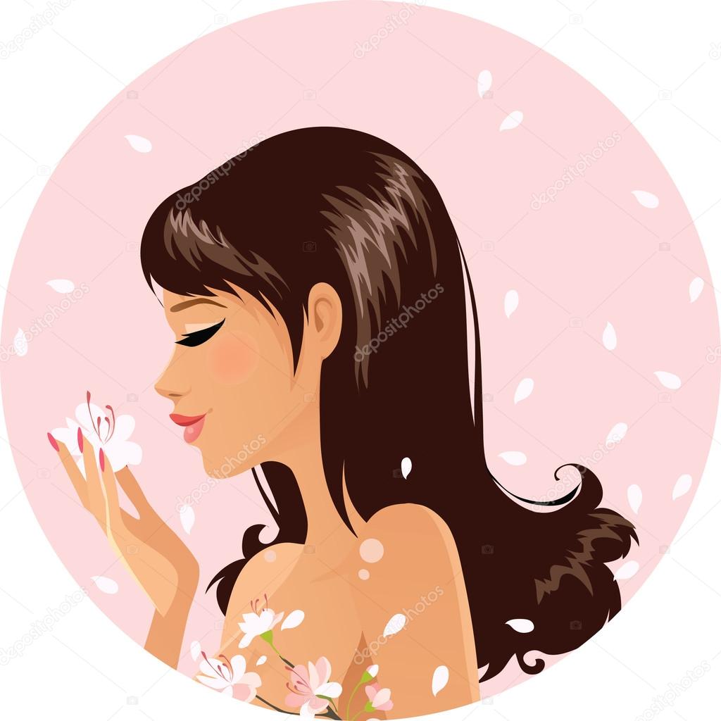 Girl smelling sakura flowers
