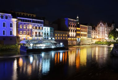 Night view on the centre of Opole city, and Odra river clipart