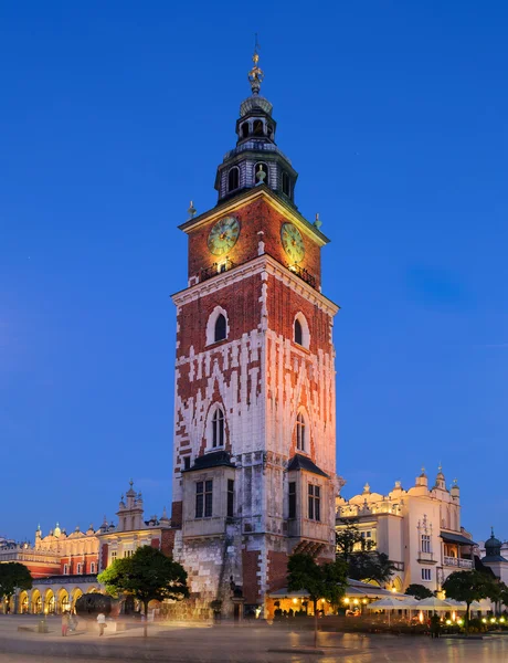 Tower of the Town Hall and Sukiennice buidning in the background — Stock Photo, Image