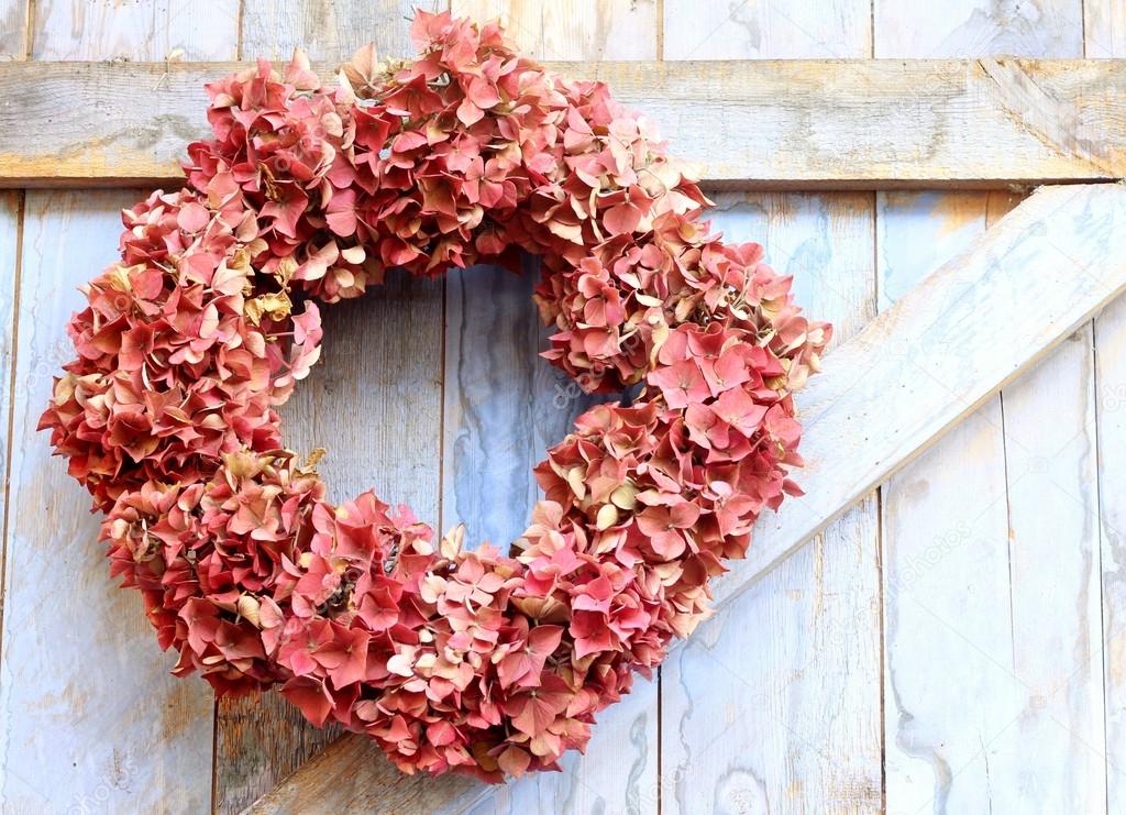 Autumn wreath of faded hydrangea flowers