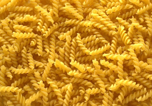 Ruwe pasta als een background — Stockfoto