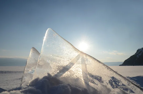 Thin transparent ice floes against the sunset light. Lake Baikal, Russia — Stock Photo, Image