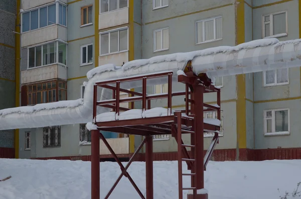 Pipes of heating main in the northern city — Stock Photo, Image