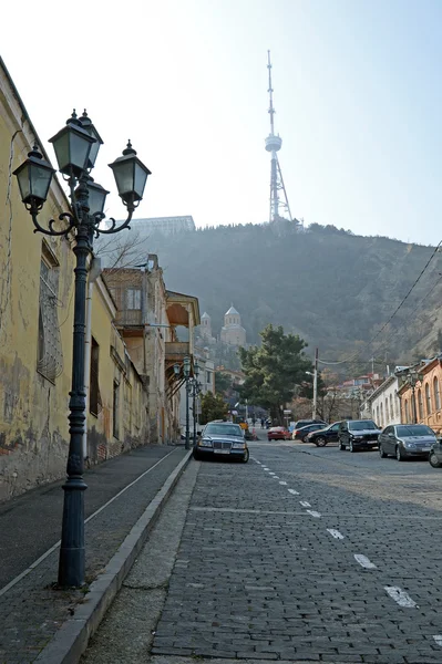 Tbilisi,Georgia-Feb,26 2015:Tbilisi Street with views of Mount Mtatsminda — Stock Photo, Image