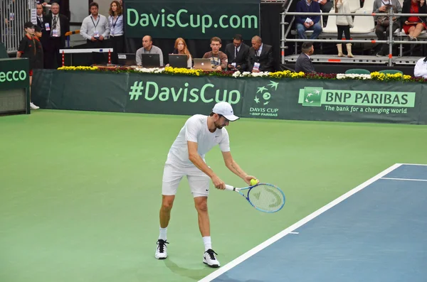 Irkutsk, Russia-Sept,19 2015: Konstantin Kravchuk serve. Davis Cup World Group Play-offs. Russia - Italy. Sports Palace 'Baikal-Arena', Irkutsk, RUS (hard - indoors) — Stockfoto