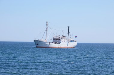 Baikal, Russia - July,26 2015: The research vessel G.Y. Vereschagin on Lake Baikal clipart